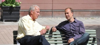 Bob & Gregg Vanourek sitting on a bench